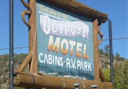 Outpost Motel Cabins and RV Park Logo